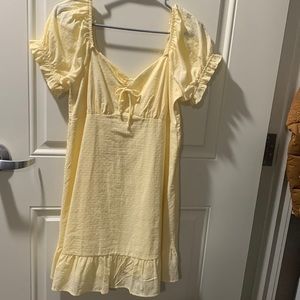 Light yellow puffy short sleeved dress! Super cute for spring and summer!